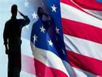Veterans A person saluting in front of an American flag